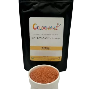 Colorwayz Caramel Cotton Candy Sugar in a black resealable bag with a bowl of caramel-flavored sugar, made with natural ingredients for vibrant and delicious cotton candy.