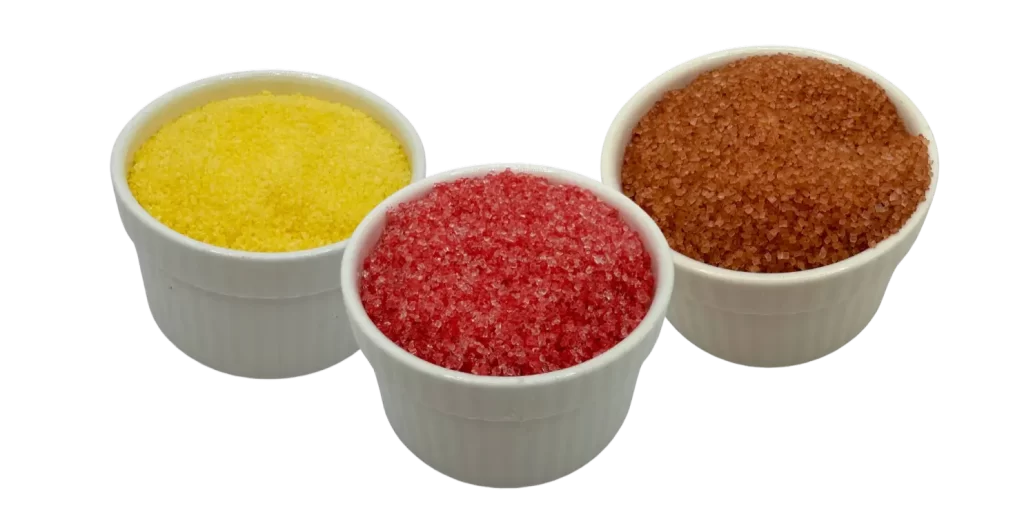 Colorwayz cotton candy sugar in banana, strawberry, and caramel flavors, showcasing vibrant natural colors and flavors for making fluffy, delicious cotton candy.