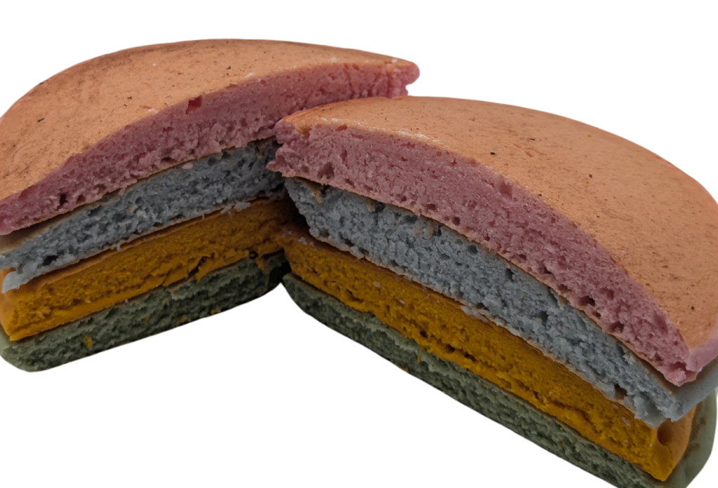 Close-up of beautifully layered pancakes in various colors made with Colorwayz's best pancake mix.