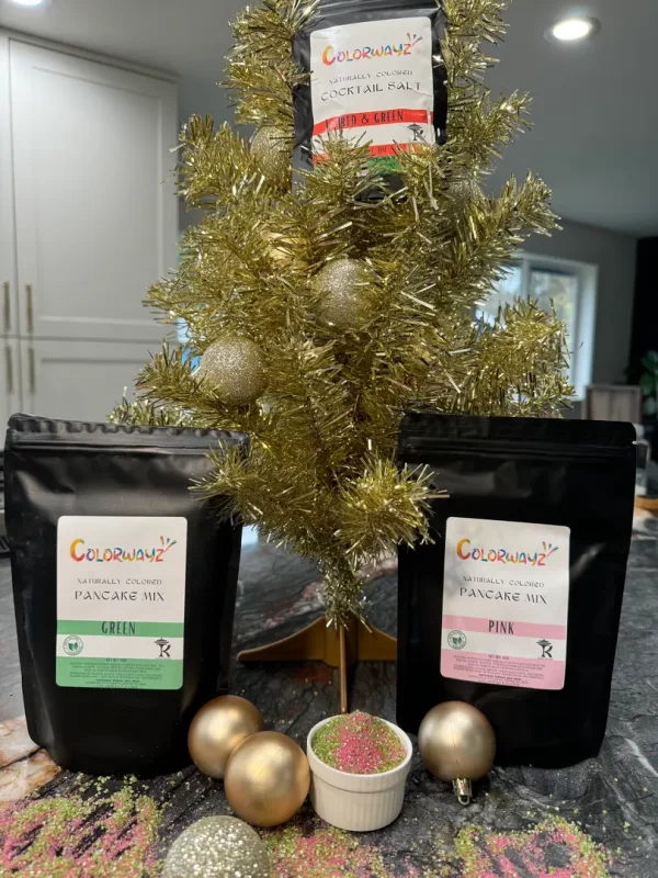 Christmas bundle of naturally colored pancake mixes in green and pink, along with red & green cocktail salt, ideal for holiday celebrations.